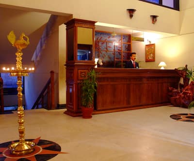 https://imgcld.yatra.com/ytimages/image/upload/t_hotel_yatra_city_desktop/v1439538263/Domestic Hotels/Hotels_Thiruvananthapuram/Hotel Swagath Drive Inn/Reception_1.jpg